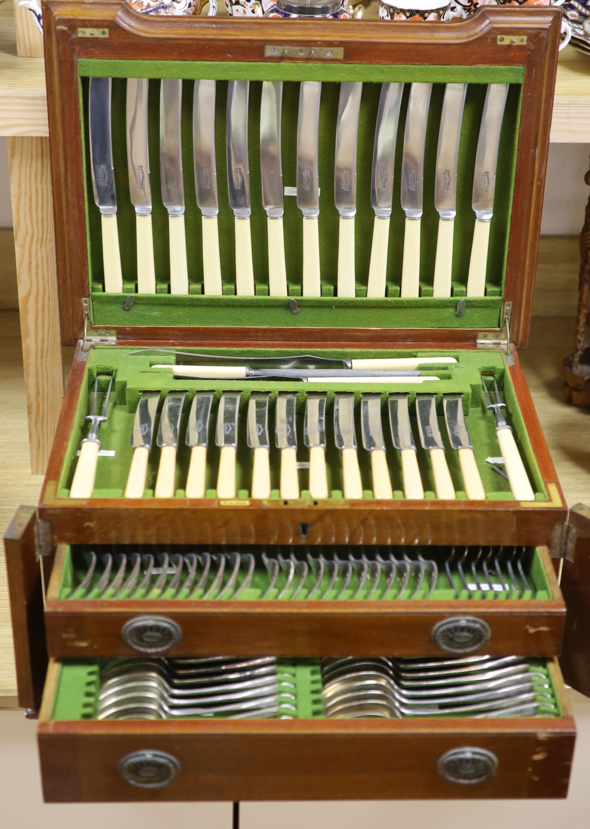 A mahogany cased canteen of silver-plated cutlery